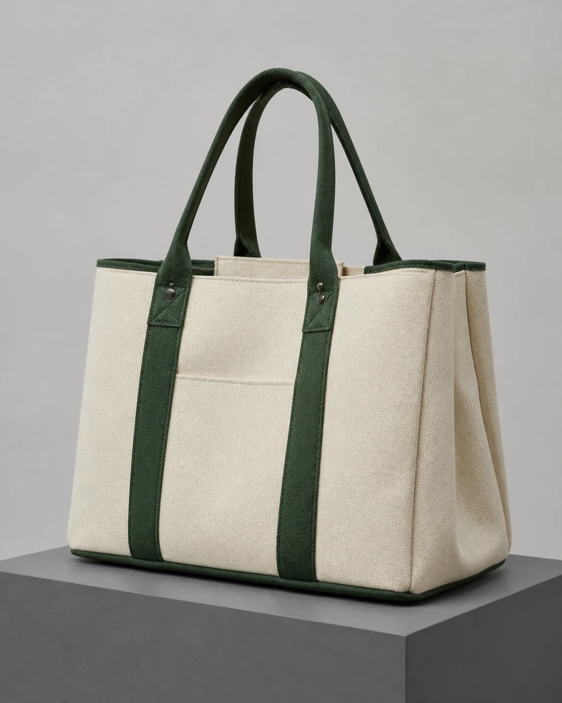 AI concept of an unbranded structured canvas tote with reinforced green handles.