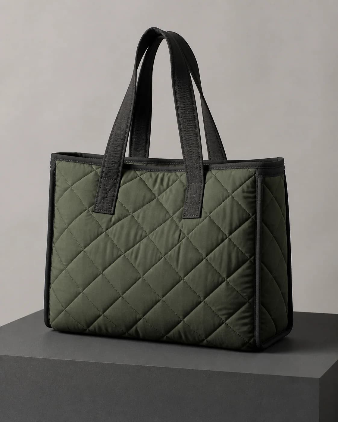 AI concept of an unbranded forest-green diamond-quilted tote.